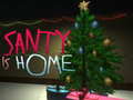 Lojë Santy is Home